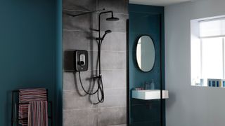 black power shower in teal bathroom