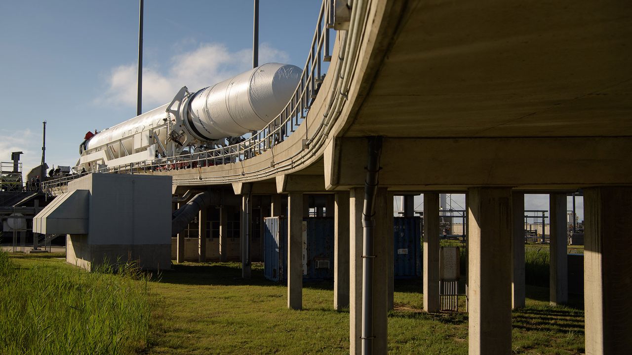 A Northrop Grumman Antares rocket arrives at launch Pad-0A, Tuesday, Oct. 29, 2019, at NASA's Wallops Flight Facility in Virginia.