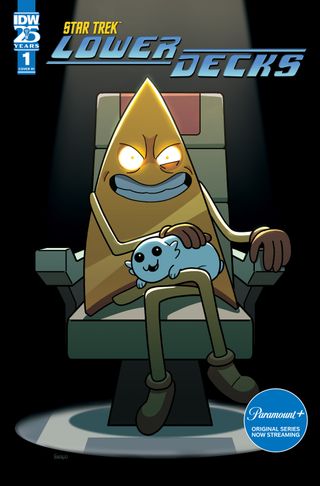 A gold chevron emblem sits in a chair with a cute alien creature