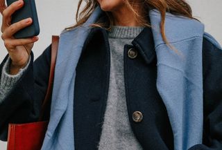 woman in sweaters and jacket