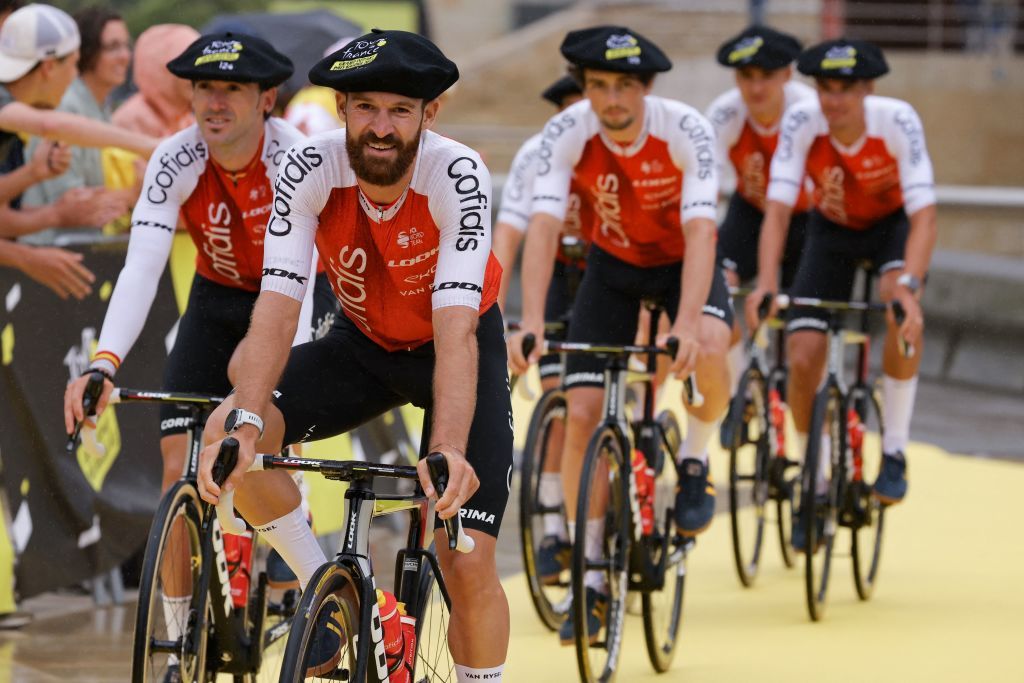 Cofidis German rider Simon Geschke C cycles with teammates to the stage during the official teams presentation near the Guggenheim Museum Bilbao in Bilbao northern Spain on June 29 2023 two days prior to the start of the 110th edition of the Tour de France cycling race Photo by Thomas SAMSON AFP Photo by THOMAS SAMSONAFP via Getty Images