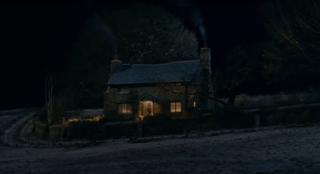 The Holiday's Rosehill Cottage in England at night