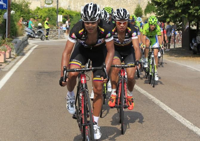 Team Colombia puts riders on the front to help bring back the break.