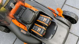 Worx WG743 POWER SHARE 40-Volt 17 in. Cordless Mower being tested in writer's home