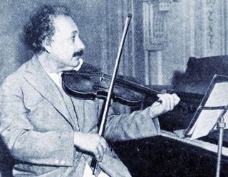 Albert Einstein playing violin.