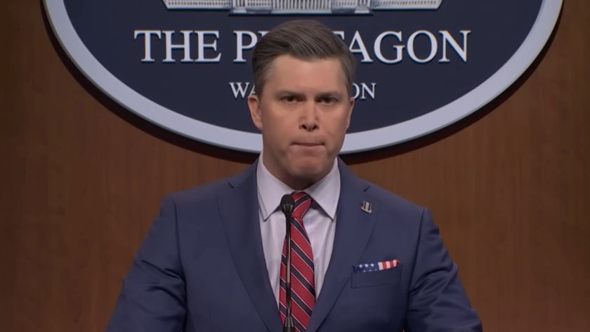 Colin Jost gives a press conference as Pete Hegseth on SNL.
