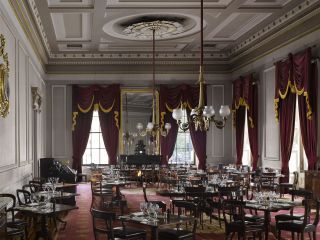 The Athenaeum - Waterloo Place - London SW1. The Coffee Room with its new pelmets. Photograph: Will Pryce/Country Life Picture Library