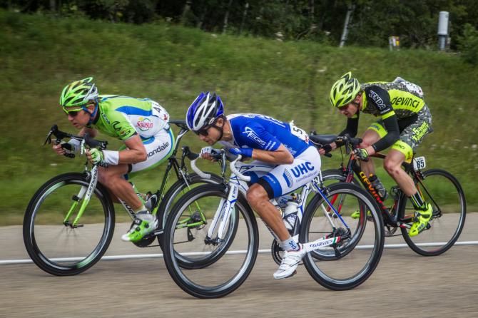 The front of the break tries to get as much free speed as possible on the descent