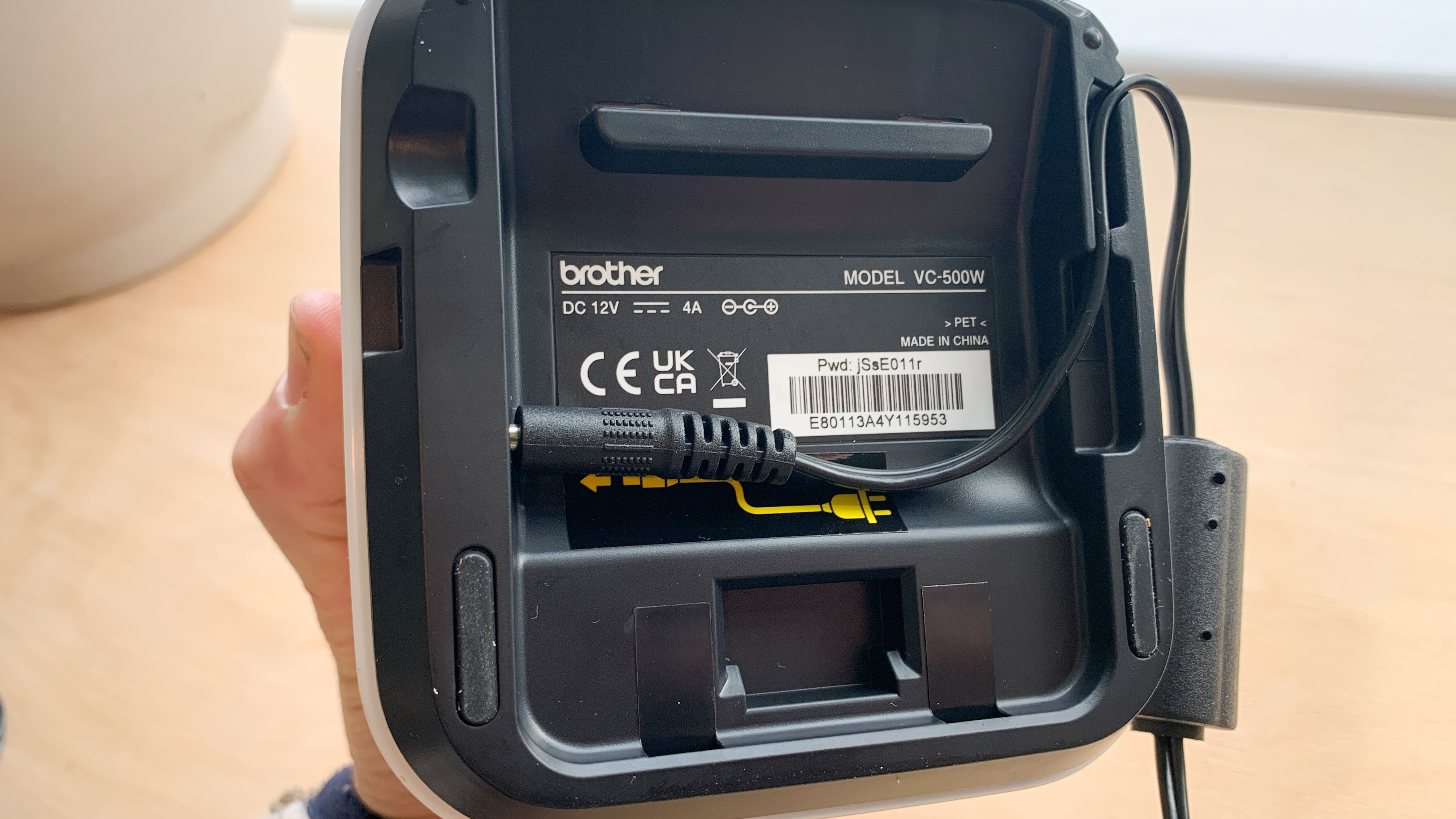 Brother VC-500W thermal printer on a wooden table