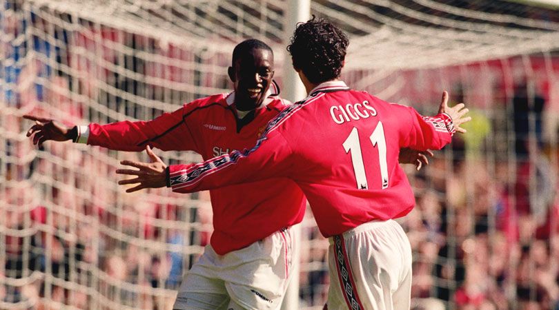 Ryan Giggs celebrates with Dwight Yorke