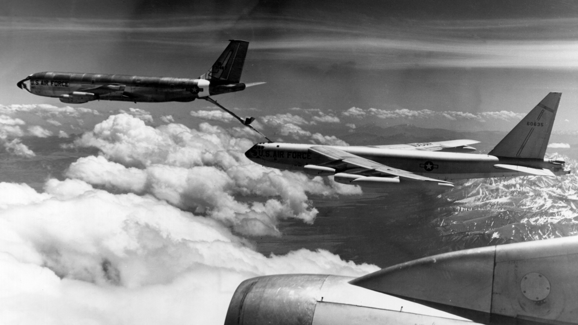 A B-52 bomber pictured during mid-air re-fueling