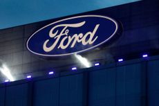 The Ford logo on the company's Michigan headquarters. 