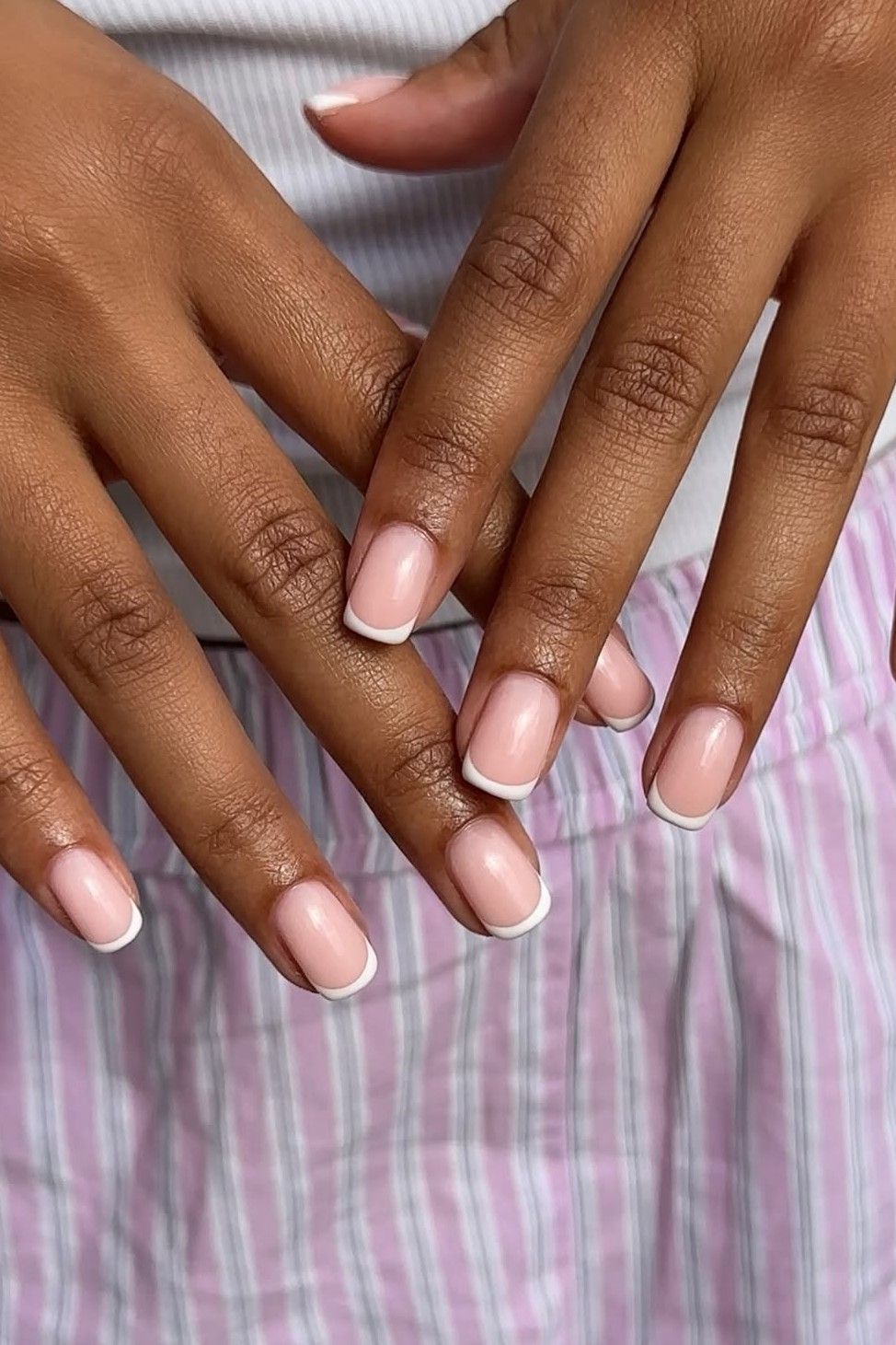 A pink and white French manicure.