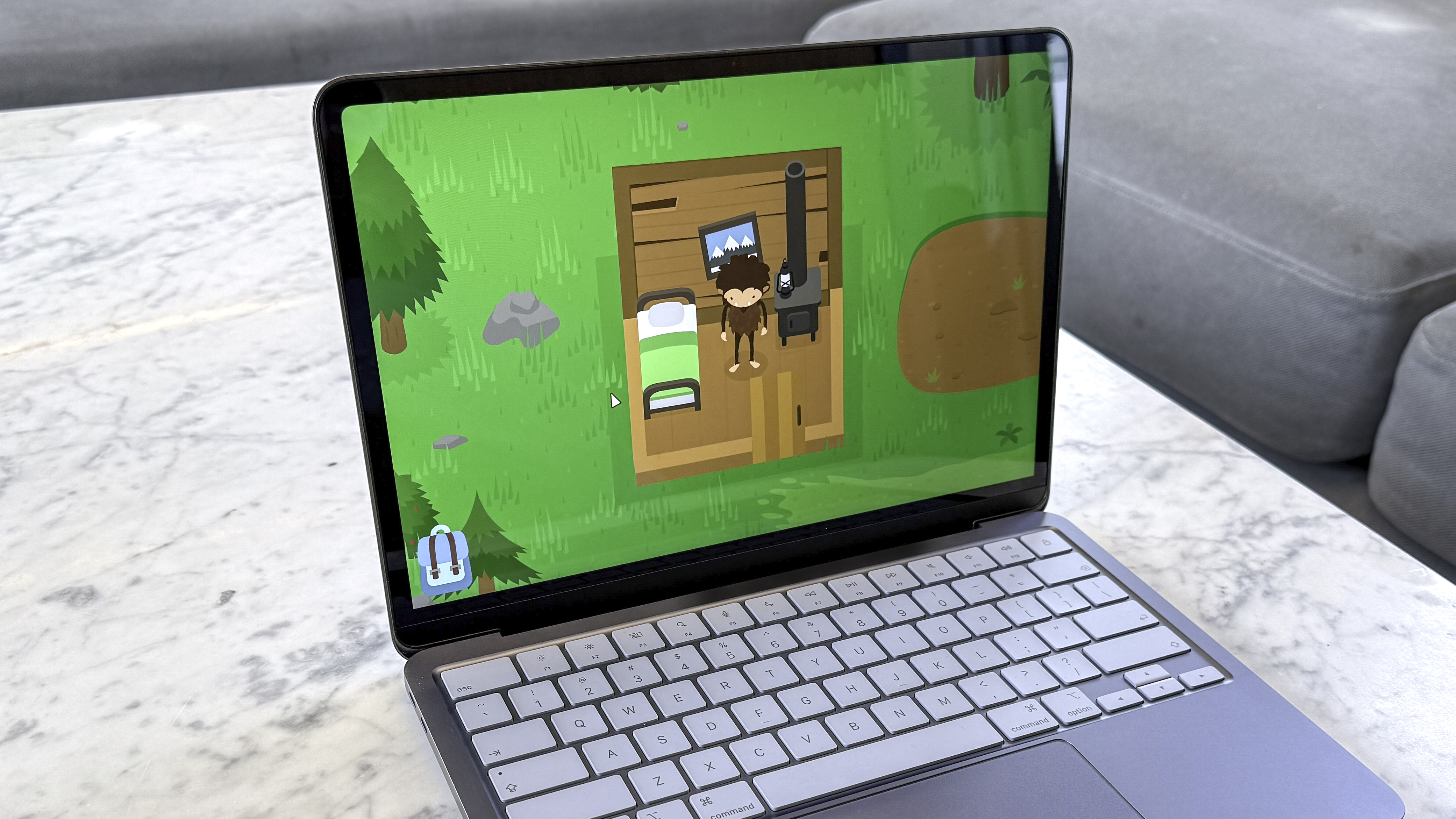 MacBook Neo playing Sneaky Sasquatch