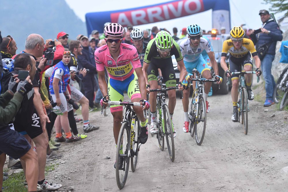 Alberto Contador gets out the saddle on the early slopes of the Colle delle Finestre