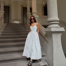 Debora Rosa in a white Nia dress