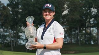 Ally Ewing poses for a photo with the Solheim Cup