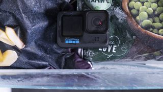 A GoPro camera in a freezer drawer