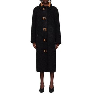 flat lay image of black coat