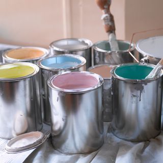 Open cans of paint