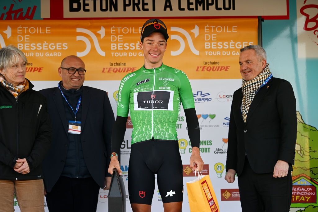 BELLEGARDESURVALSERINE FRANCE FEBRUARY 01 Simon Pellaud of Switzerland and Tudor Pro Cycling Team celebrates at podium as Green Most Combative Rider during the 53rd Etoile de Besseges Tour Du Gard 2023 Stage 1 a 16218km stage from Bellegarde to Bellegarde EDB2021 on February 01 2023 in BellegardesurValserine France Photo by Luc ClaessenGetty Images