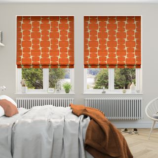 Roman blinds in a bedroom by Blinds2Go