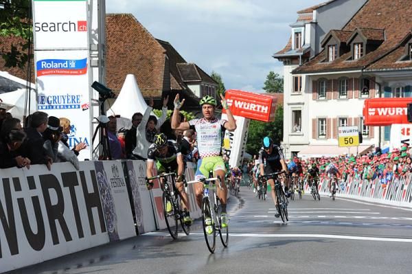 Peter Sagan (Liquigas-Cannondale) raises his arms as he wins stage 3