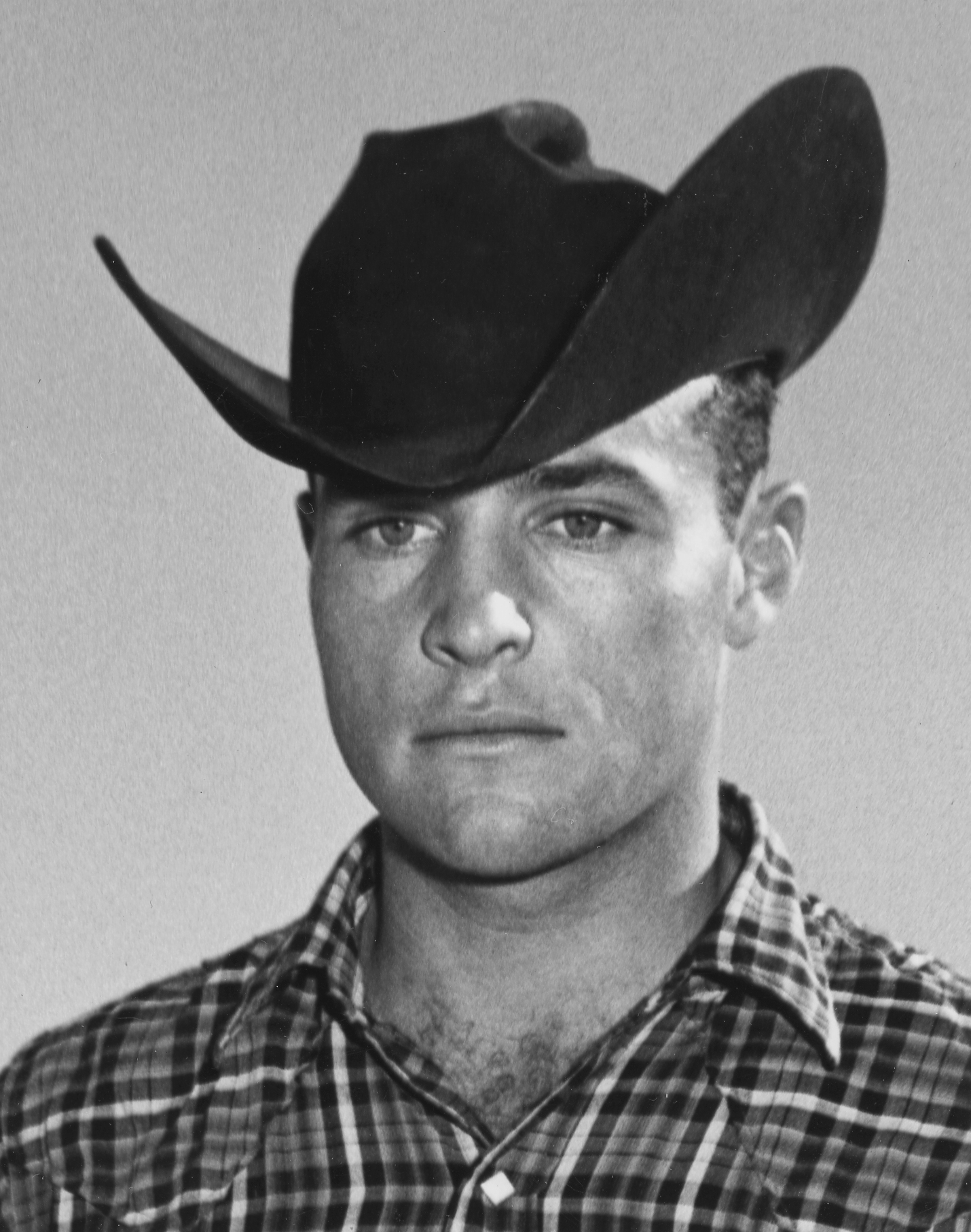 black and white images of cowboys