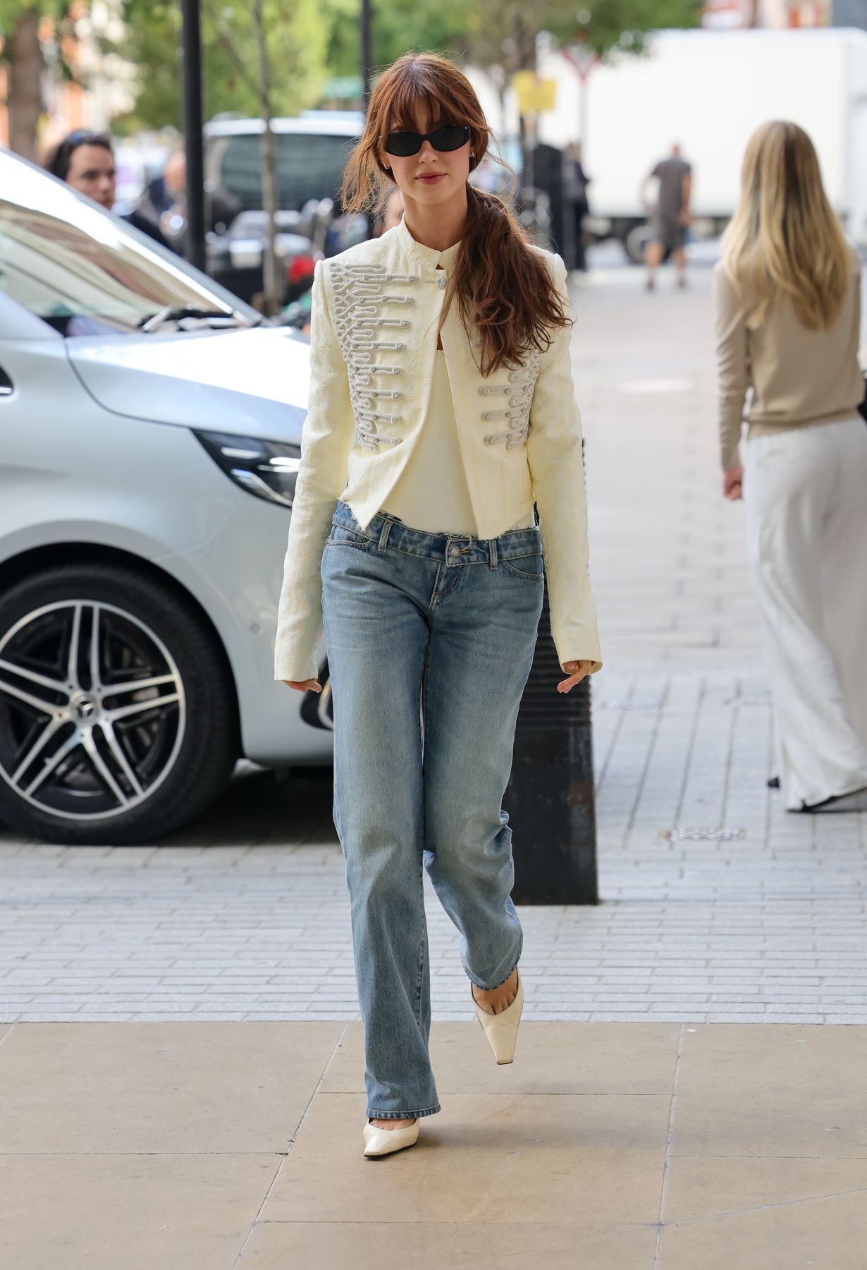 Daisy Edgar-Jones styled the military jacket trend from McQueen on the Sense & Sensibility press tour