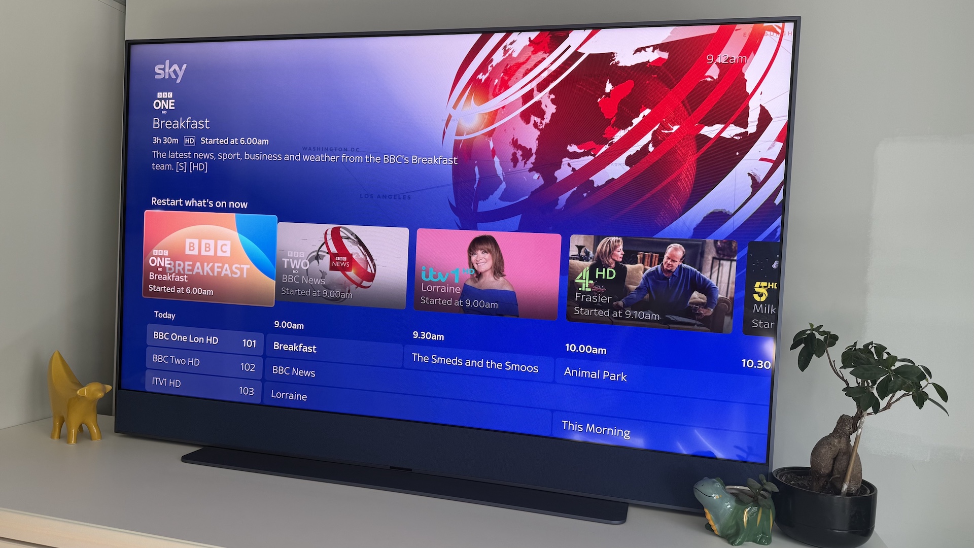 The Sky Glass Gen 2 screen on a white cabinet