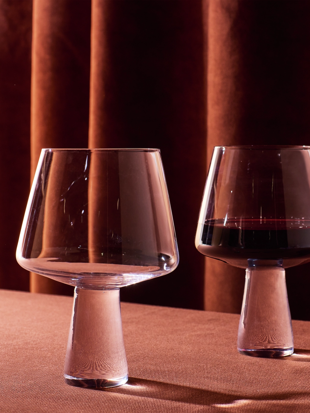 A set of red wine glasses with thick stems from Habitat