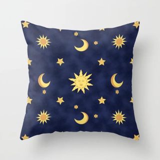 Navy blue pillow with stars and moons