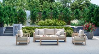 wooden outdoor furniture on a patio