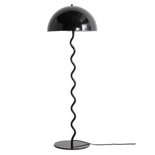 A black floor lamp with wiggly base