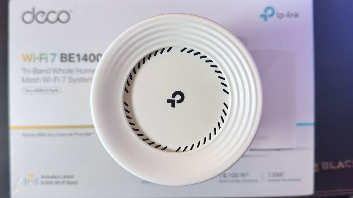 A top-down view of the TP-Link Deco BE68 router.