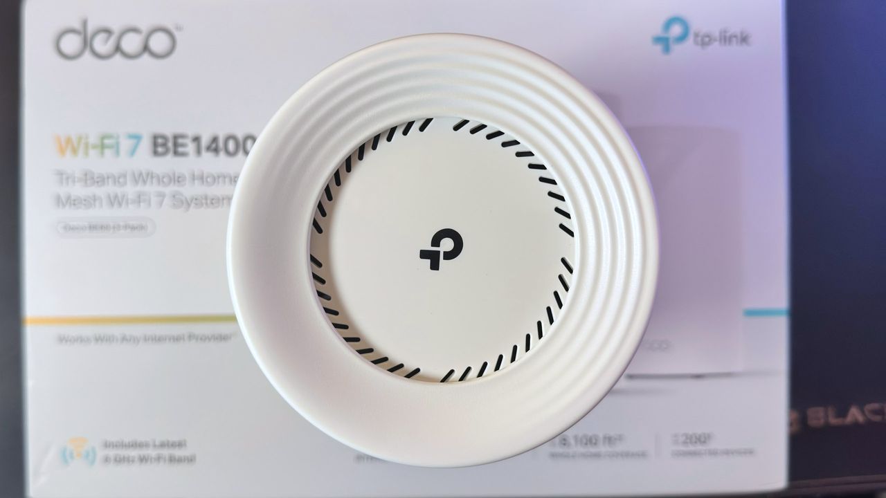 A top-down view of the TP-Link Deco BE68 router.