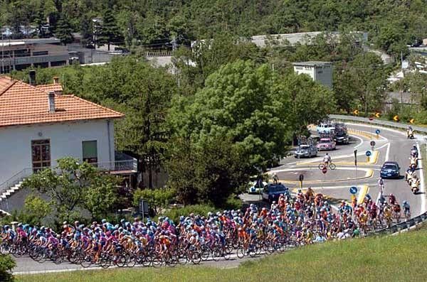 The peloton passes through one of the towns on today's route
