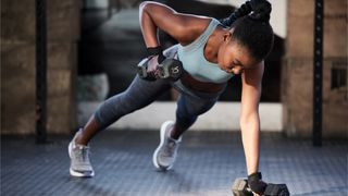 Woman performing renegade row