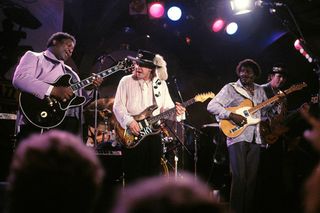 From left, B.B. King, Stevie Ray Vaughan, Albert Collins and bassist Tommy Shannon perform April 22, 1988, at the New Orleans Jazz & Heritage Festival