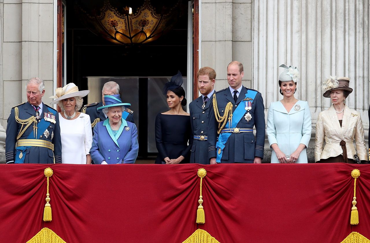 Prince Charles, Prince of Wales, Prince Andrew, Duke of York, Camilla, Duchess of Cornwall, Queen Elizabeth II, Meghan, Duchess of Sussex, Prince Harry, Duke of Sussex, Prince William, Duke of Cambridge, Catherine, Duchess of Cambridge and Anne, Princess Royal watch the RAF flypast