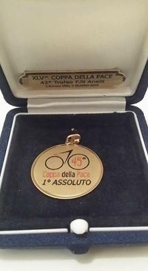 The organisers of the Coppa della Pace visited Keagan Girdlestone in hospital to present him with a winner's medal.