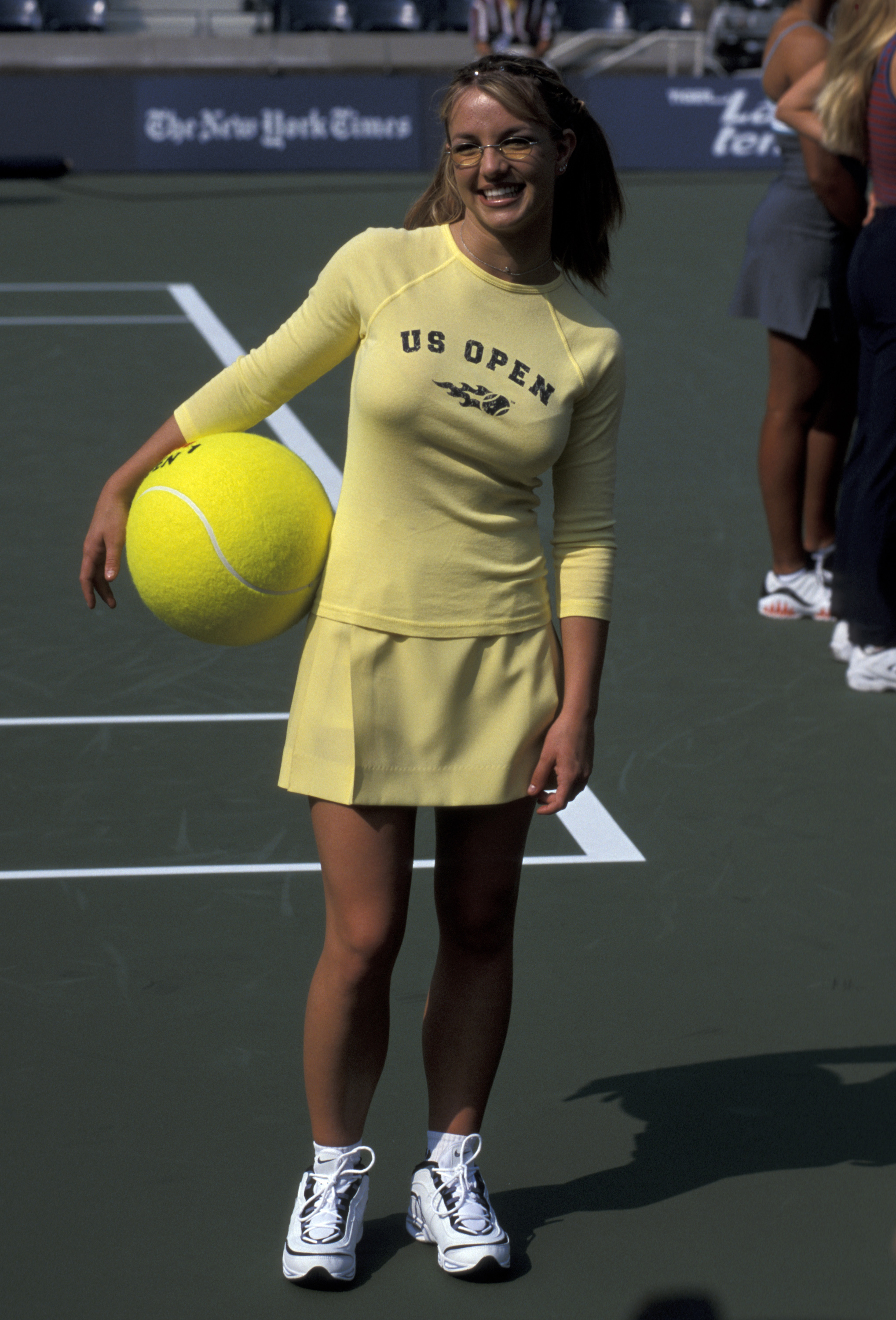 Britney Spears styled a yellow skirt set at the 1999 US Open
