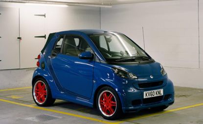 The Wallpaper* Blue Smart Car