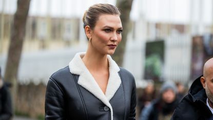 paris, france february 28 karlie kloss is seen wearing black white shearling coat outside loewe during paris fashion week womenswear fallwinter 20202021 day five on february 28, 2020 in paris, france photo by christian vieriggetty images