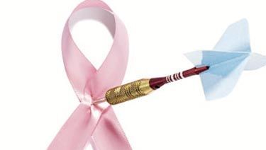 pink ribbon with dart through it