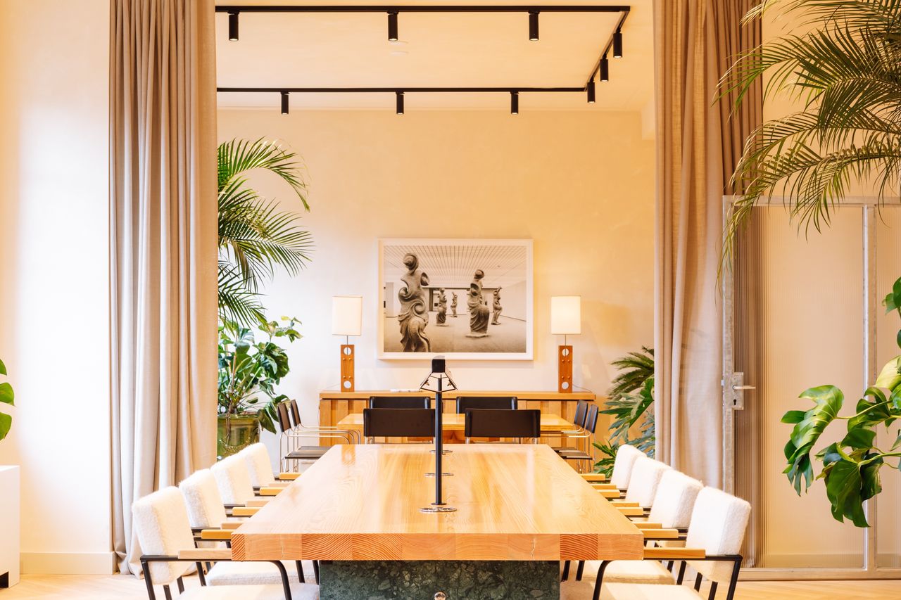 Interior design of the Prinsengracht venue with large tables and chairs, by Fosbury &amp; Sons