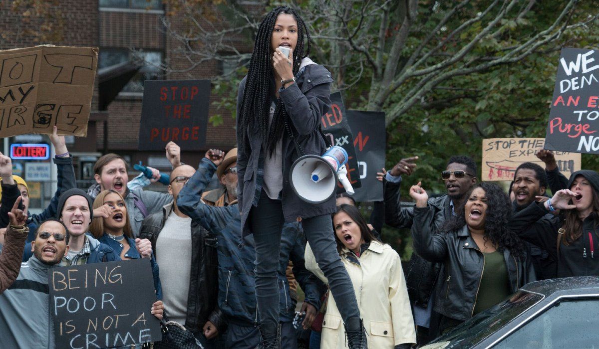 Lex Scott Davis leads a protest against The First Purge.