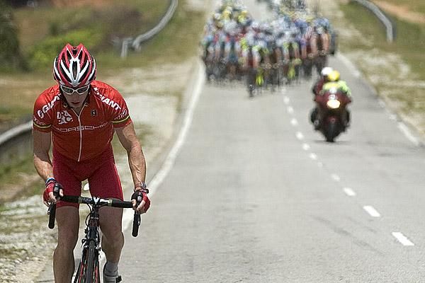 Caught: Peter McDonald (Drapac Porsche) of Australia is finally caught around the 144km mark after riding solo for more than 80kms on stage one.