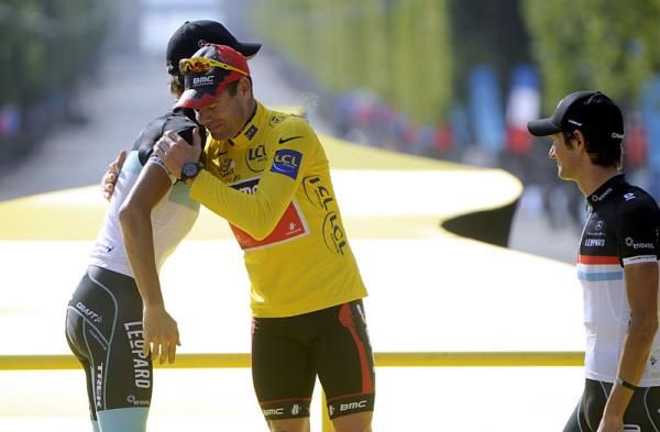 Cadel Evans (BMC) gets a hug from his toughest competition.