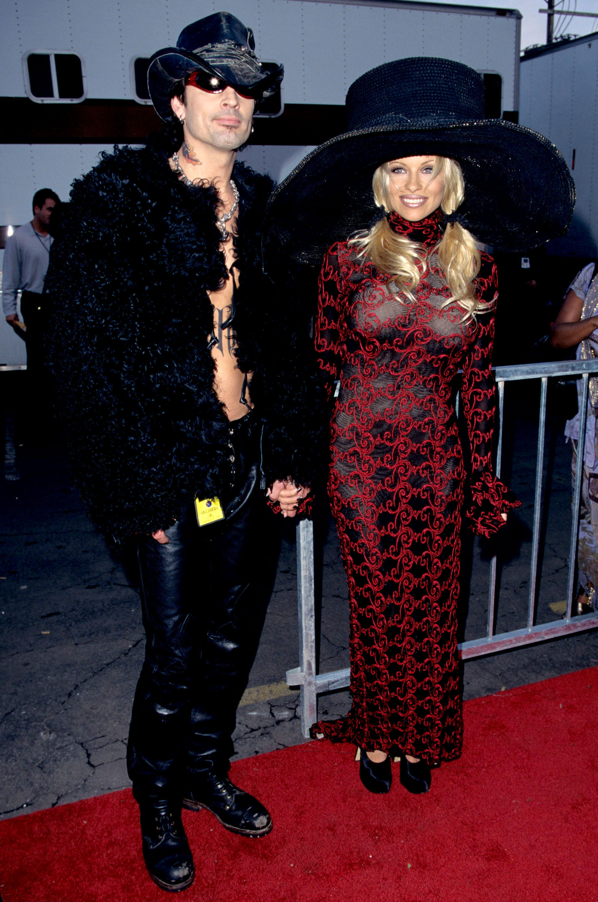 Pamela Anderson styled a sheer long-sleeve dress at the American Music Awards
